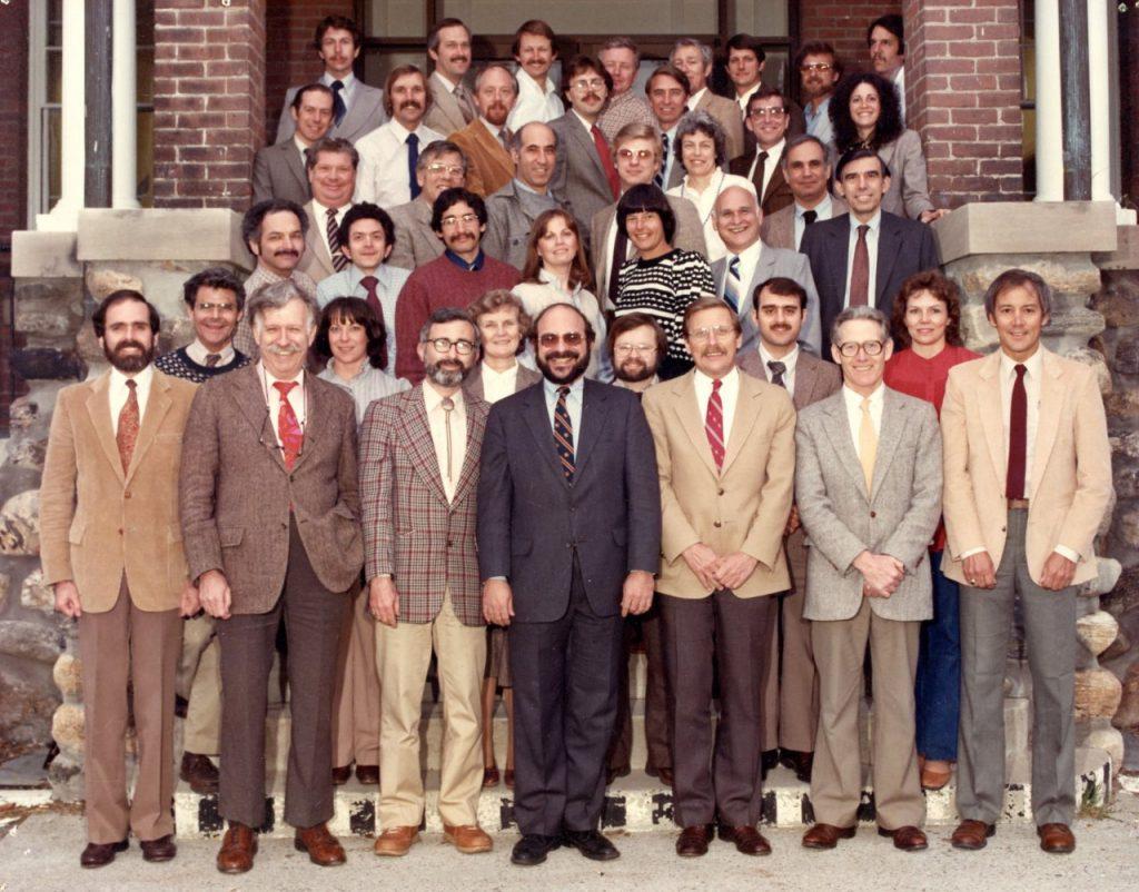 The group of faculty standing on the front steps of the Cummings School Administrative Building.  Young Dr. Jim Ross can be seen in the fourth row, second from right.