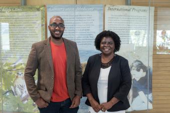 Hellen Amuguni and Denis Majyambere standing together.