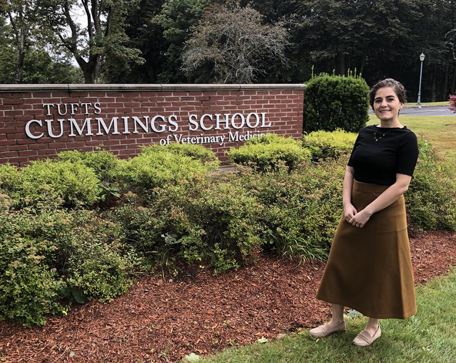 Elena Iacono Standing in front of the Cummings School sign.