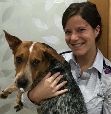 Carla Stoeffel holding a dog