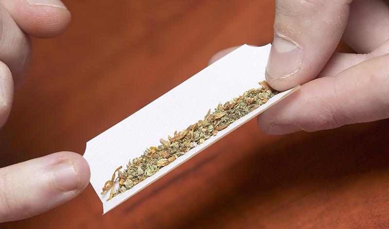 marijuana being rolled in a paper