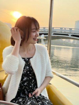 Picture of Qingying Fend sitting on a boat