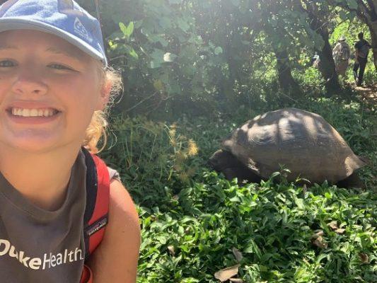 Reagan Munday poses for a picture with a tortious 