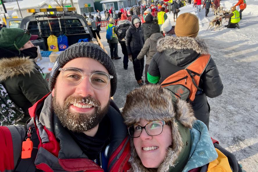 A man and woman dressed in winter outside in cold weather