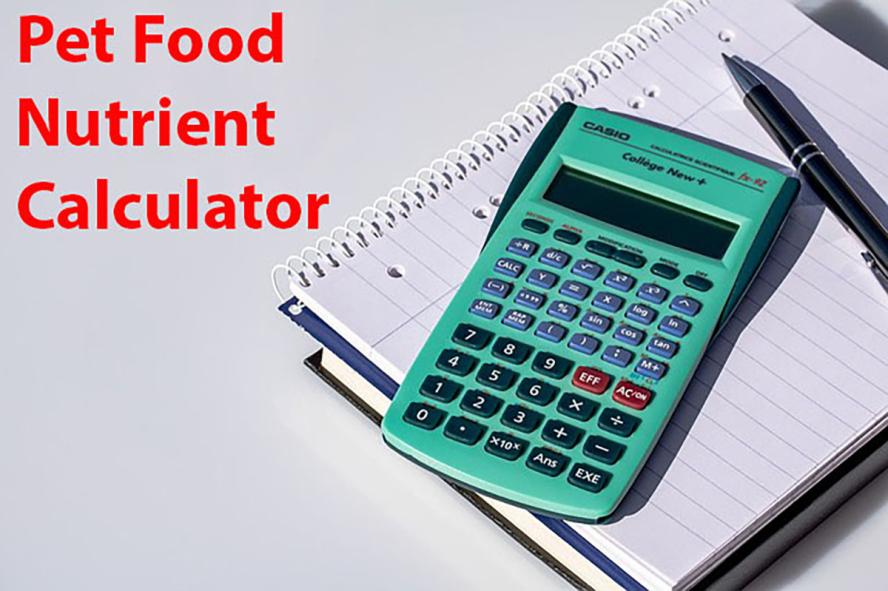 a green calculator lying on a note pad. Words in red are Pet Food Nutriend Calculator