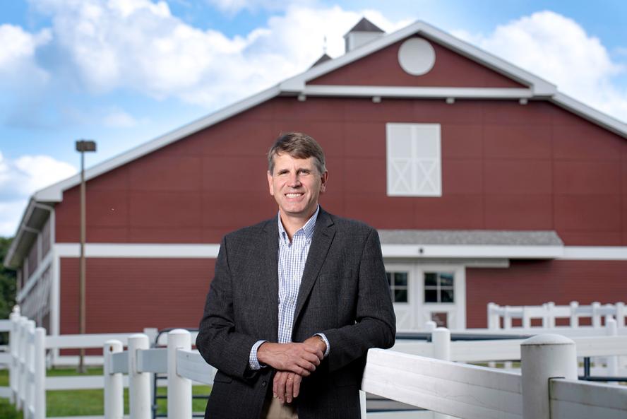 Dean Alastair Cribb in front of Cummings School’s Equine Sports Medicine Complex.