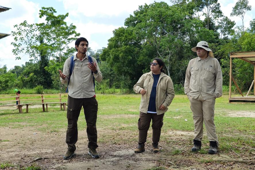 A veterinarian and Ph.D. candidate working in the field with his research team in Peru.