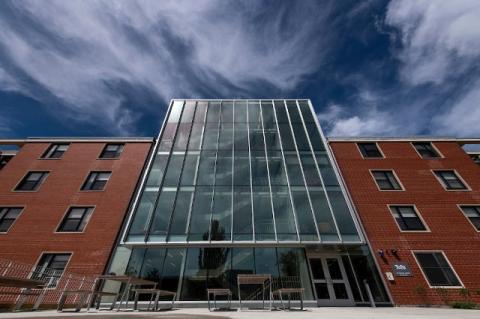 A close-up view of the exterior of a residence hall at Tufts University.