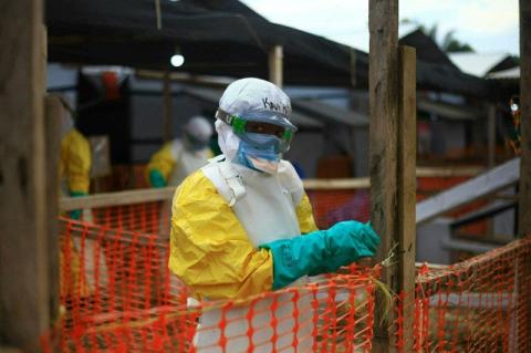 A Ebola health worker in full hazardous matter gear at a treatment center in Beni in eastern Congo, where Ebola treatments are being offered.