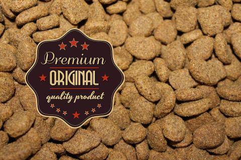A picture of pet food with a stamp that reads premium original